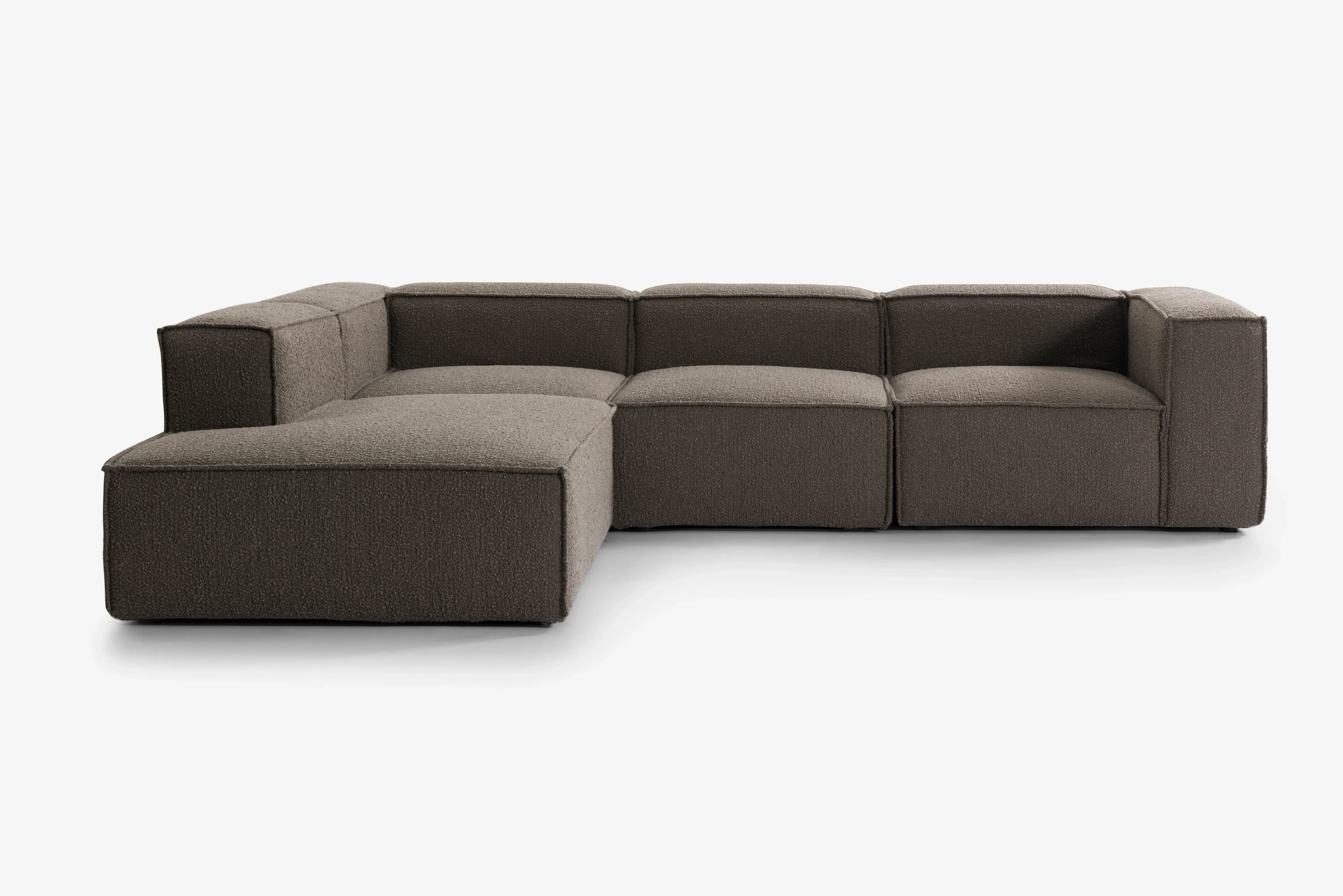 4-piece hjørnesofa m. endemodul m. aftageligt betræk i Bouclé